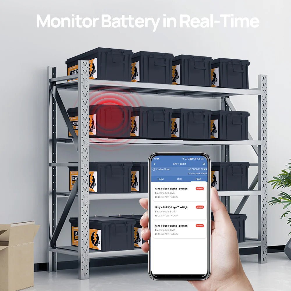 Storage rack with battery boxes and a hand holding a smartphone displaying a monitoring app.